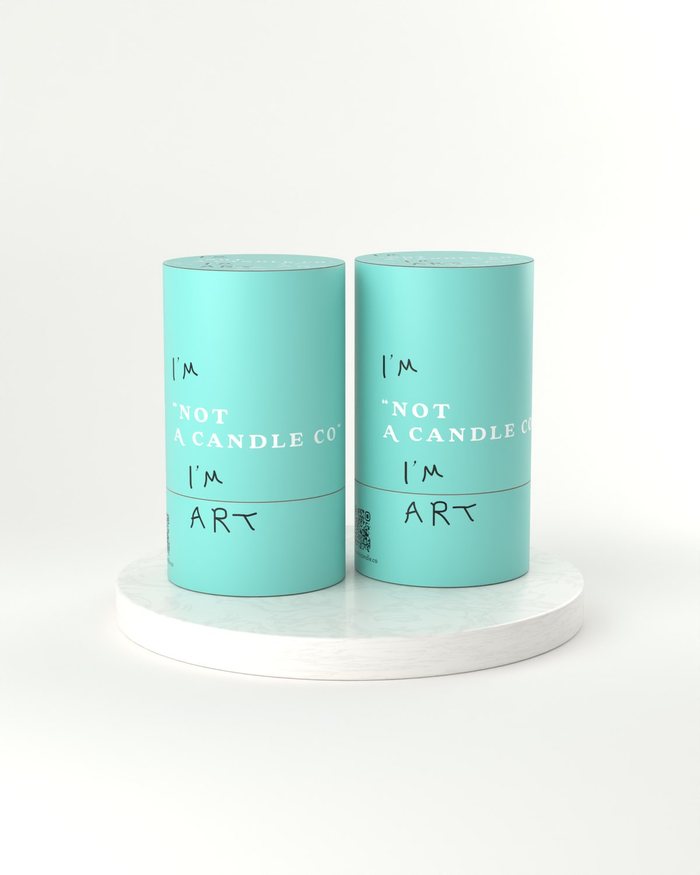 Two tubes side by side on a marble plinth